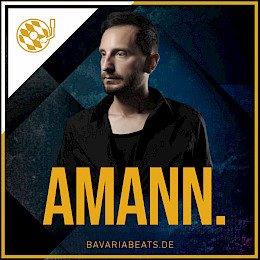 AMANN.